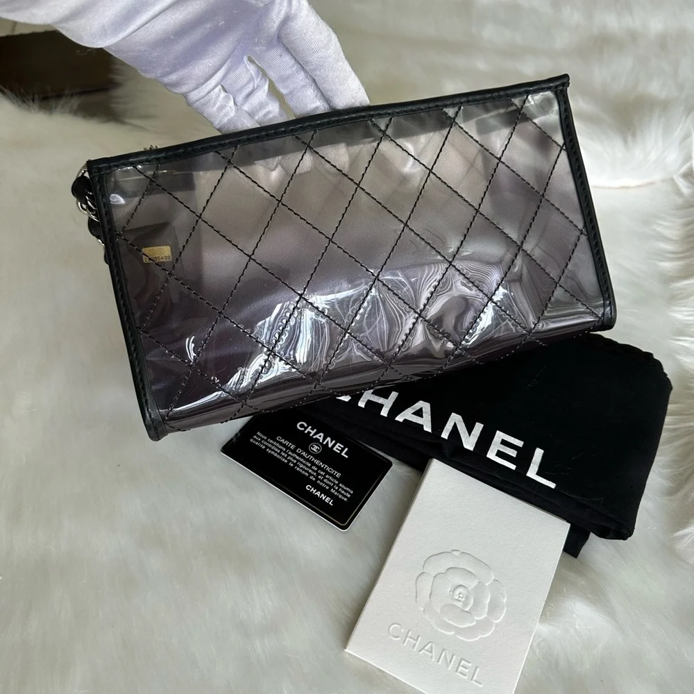 CHANEL Silver Quilted PVC Shoulder Bag with Black Trim